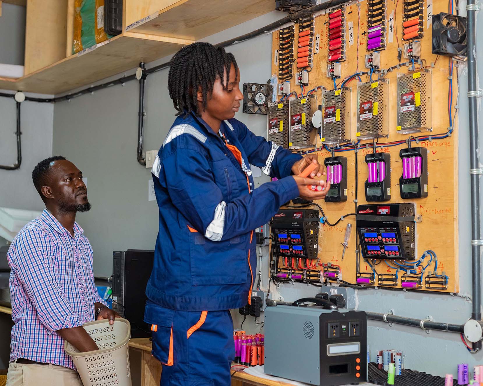 RevMake team and clean energy installations in Uganda